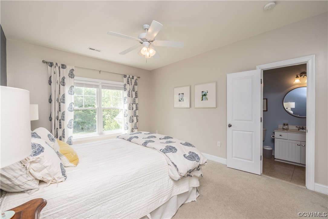 11724 Winterpock Road Chesterfield, VA 23838 - Photo 32 of 50 a bedroom with a bed and a window