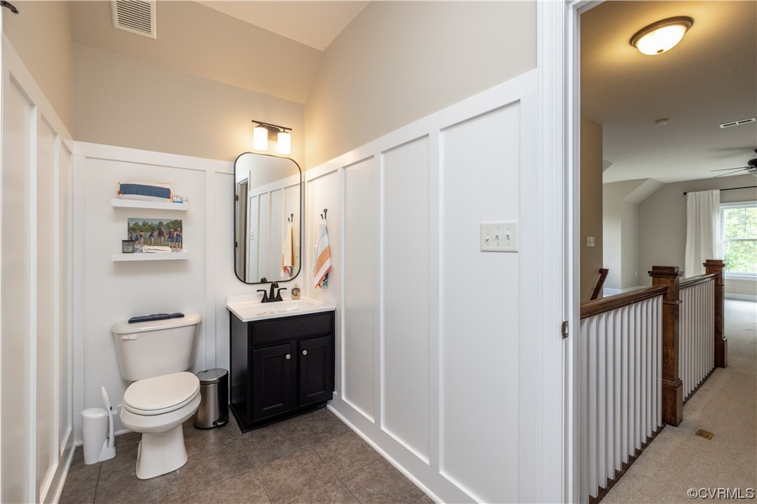 11724 Winterpock Road Chesterfield, VA 23838 - Photo 39 of 50 a bathroom with a toilet a sink and mirror