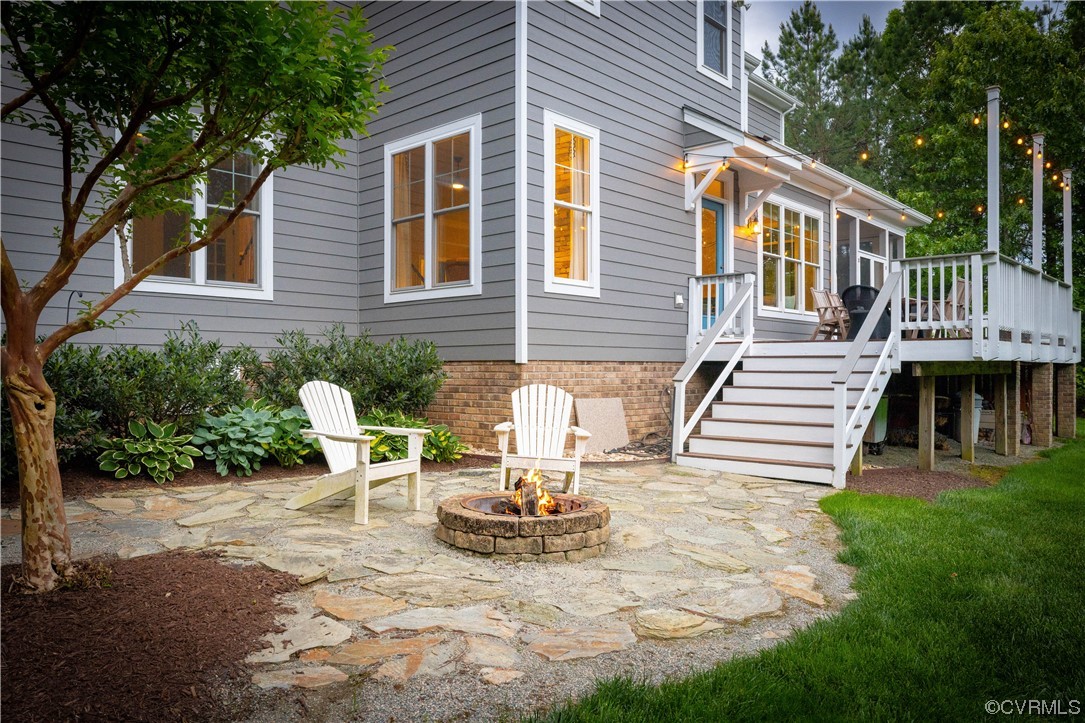11724 Winterpock Road Chesterfield, VA 23838 - Photo 44 of 50 a view of a patio with table and chairs and wooden fence