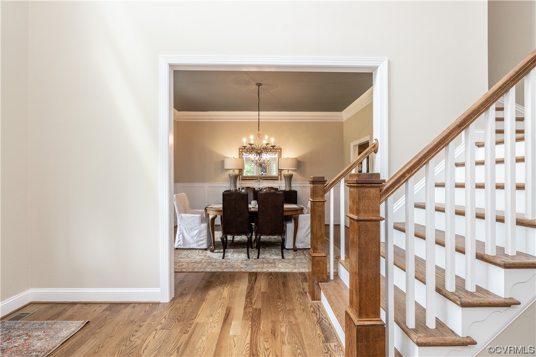 11724 Winterpock Road Chesterfield, VA 23838 - Photo 7 of 50 a dining room with furniture and chandelier