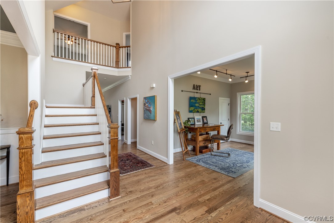 11724 Winterpock Road Chesterfield, VA 23838 - Photo 9 of 50 a view of a hallway with wooden floor and furniture