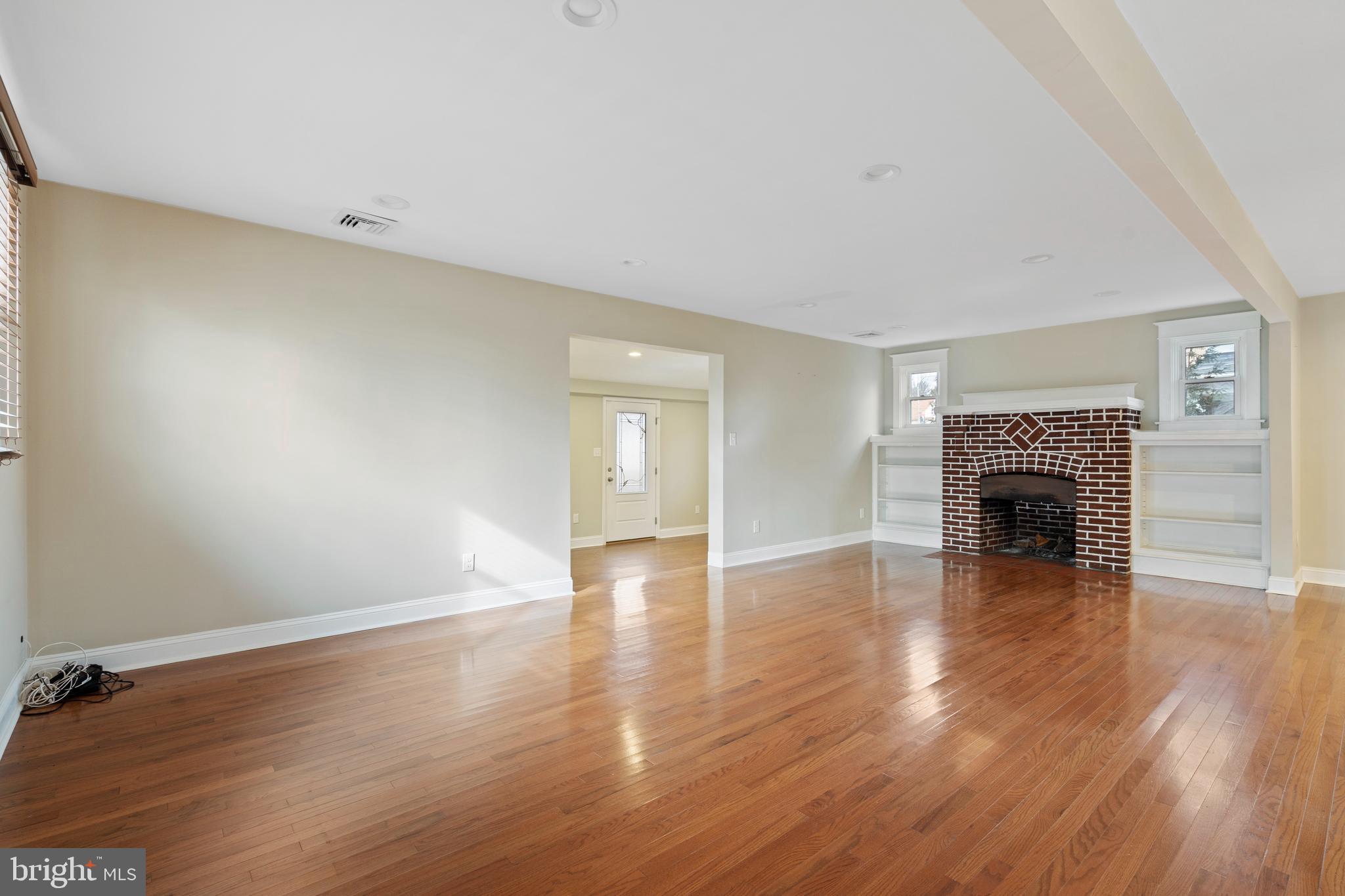 1201 Darby Road Havertown, PA 19083 - Photo 11 of 37 Your eye is drawn to the stone F.P. in the Liv Rm