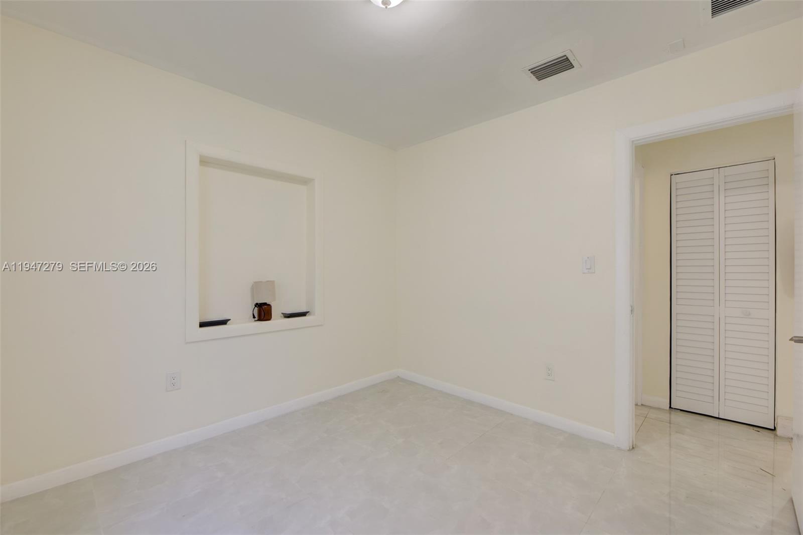 742 Northwest 70th Street, Unit 1 Miami, FL 33150 - Photo 13 of 30 a view of an empty room