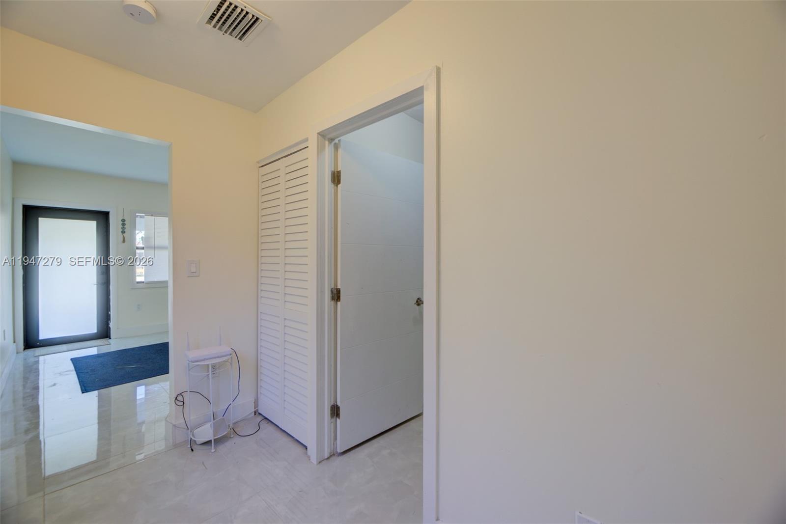 742 Northwest 70th Street, Unit 1 Miami, FL 33150 - Photo 16 of 30 a view of a room with an entryway