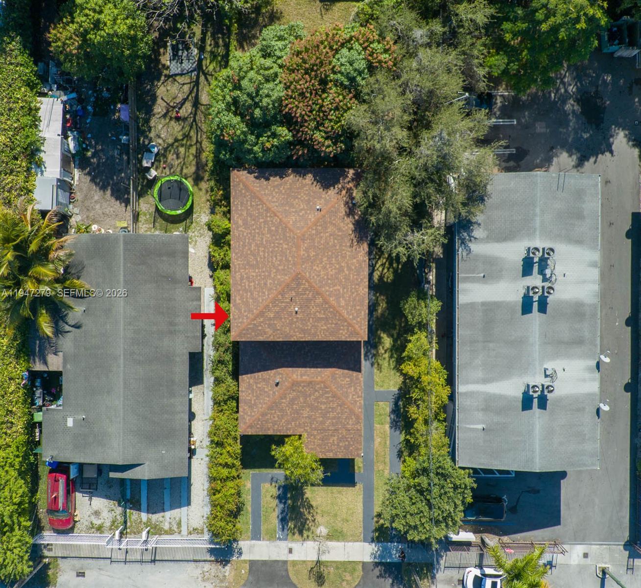 742 Northwest 70th Street, Unit 1 Miami, FL 33150 - Photo 18 of 30 an aerial view of residential houses and outdoor space