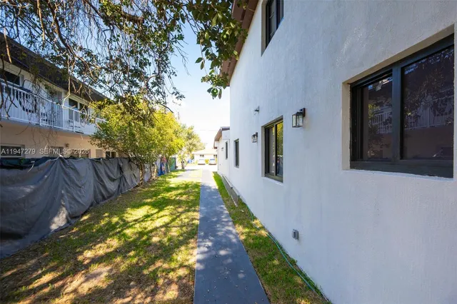 a view of a backyard of the house