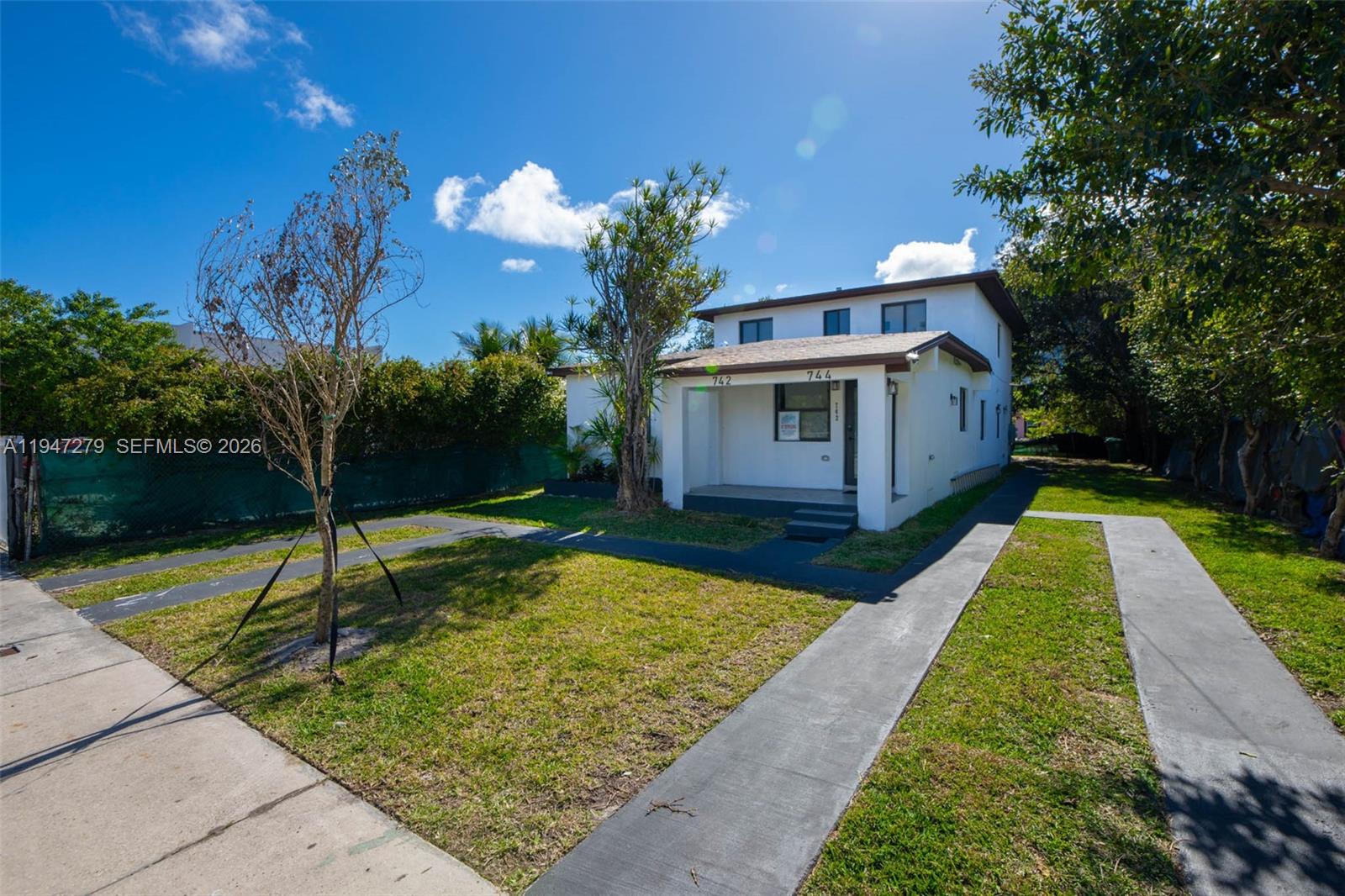 742 Northwest 70th Street, Unit 1 Miami, FL 33150 - Photo 29 of 30 a view of a backyard with a garden