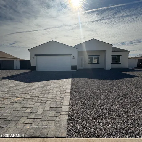 a house view with a backyard