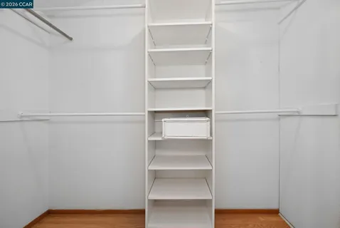 a sign that is in front of a tree