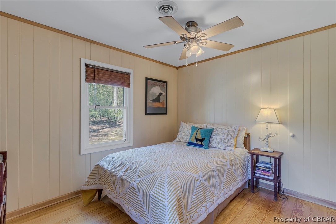 270 Robins Nest Road Lancaster, VA 22503 - Photo 43 of 50 Bedroom featuring ornamental molding, ceiling fan, and hardwood / wood-style floors