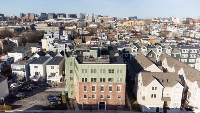 a view of city with tall buildings