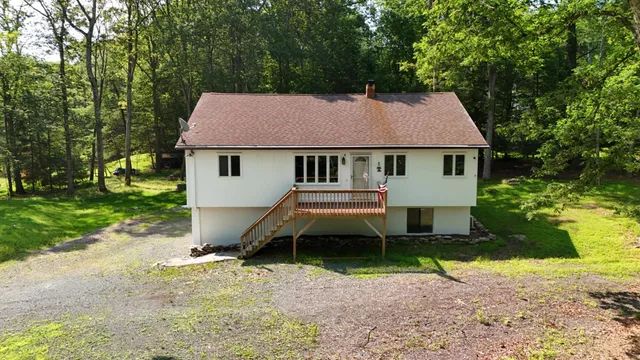 a house view with a backyard space