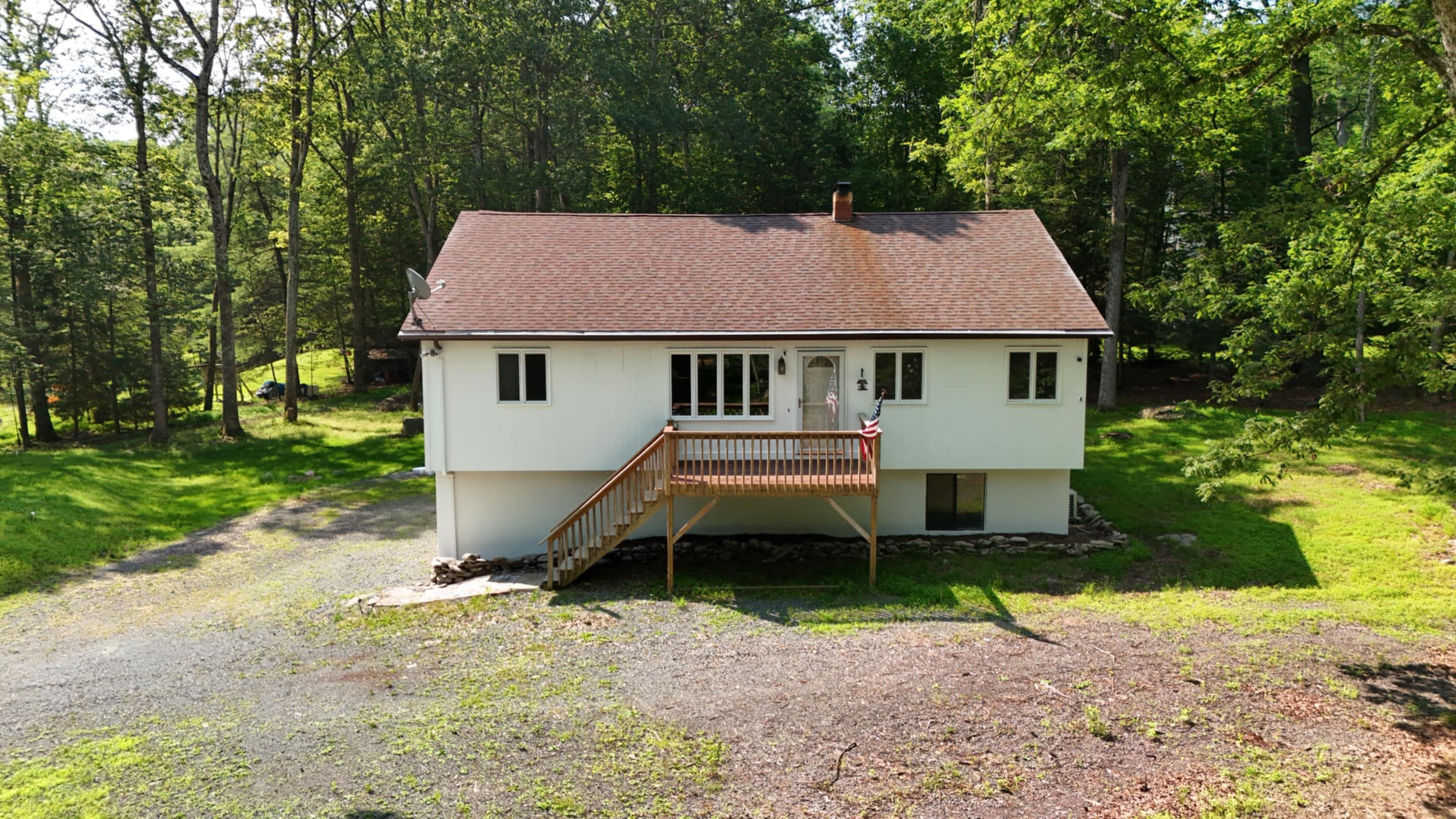 371 Ridge Circle Cresco, PA 18326 - Photo 1 of 40 a house view with a backyard space