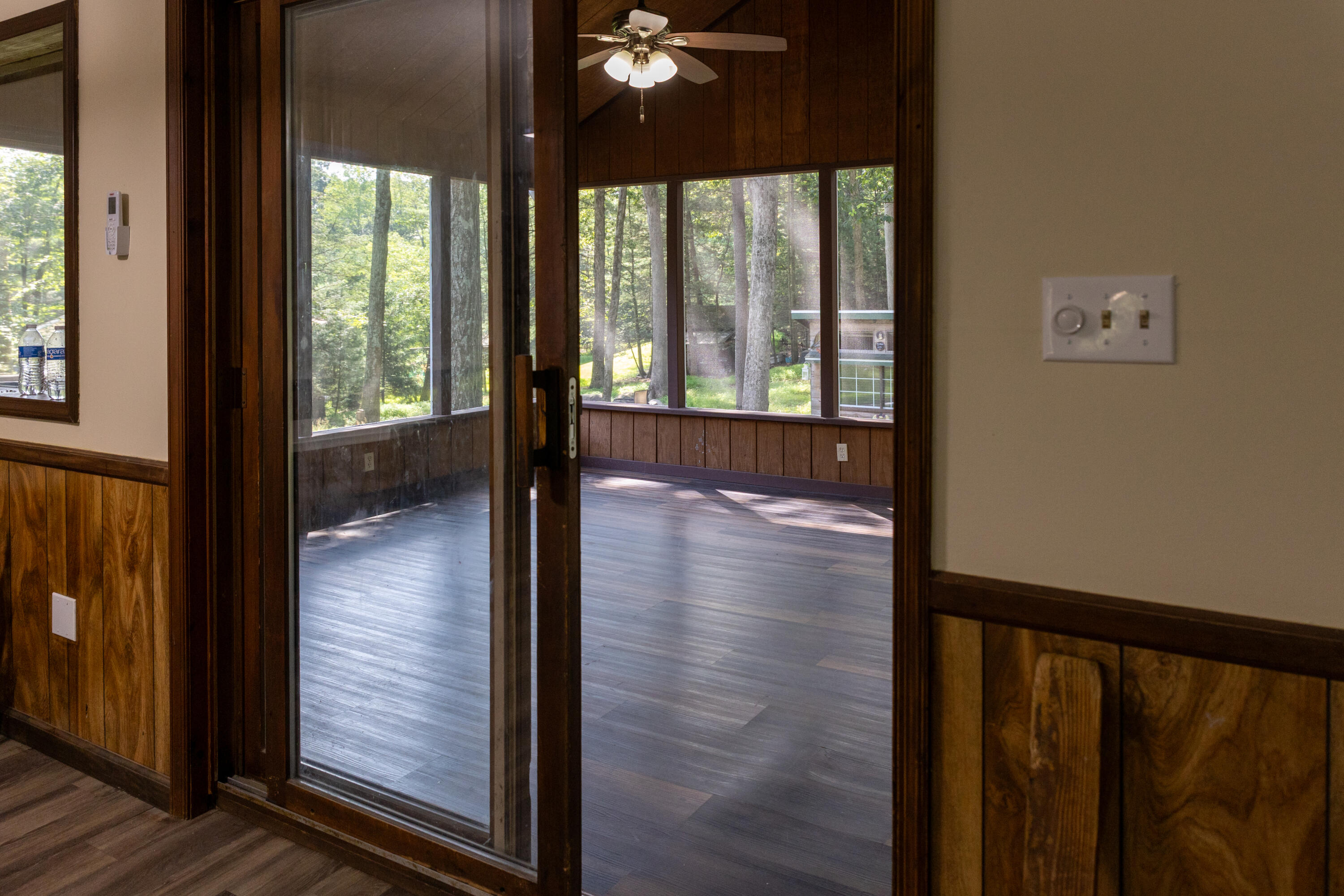 371 Ridge Circle Cresco, PA 18326 - Photo 12 of 40 a view of a hallway with wooden floor and stairs