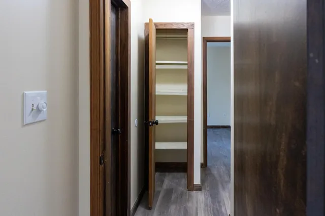 a view of a bathroom from a hallway