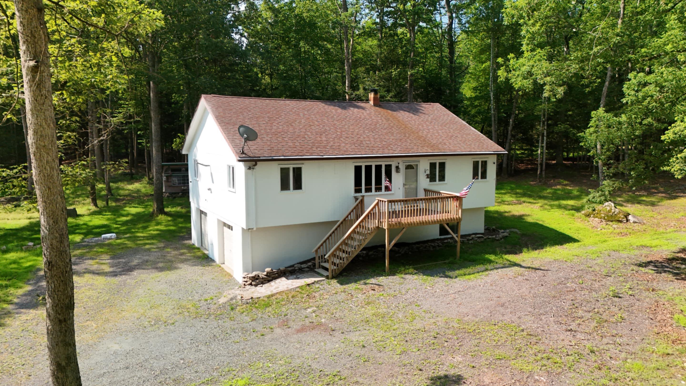 371 Ridge Circle Cresco, PA 18326 - Photo 3 of 40 a backyard of a house with yard barbeque oven and outdoor seating