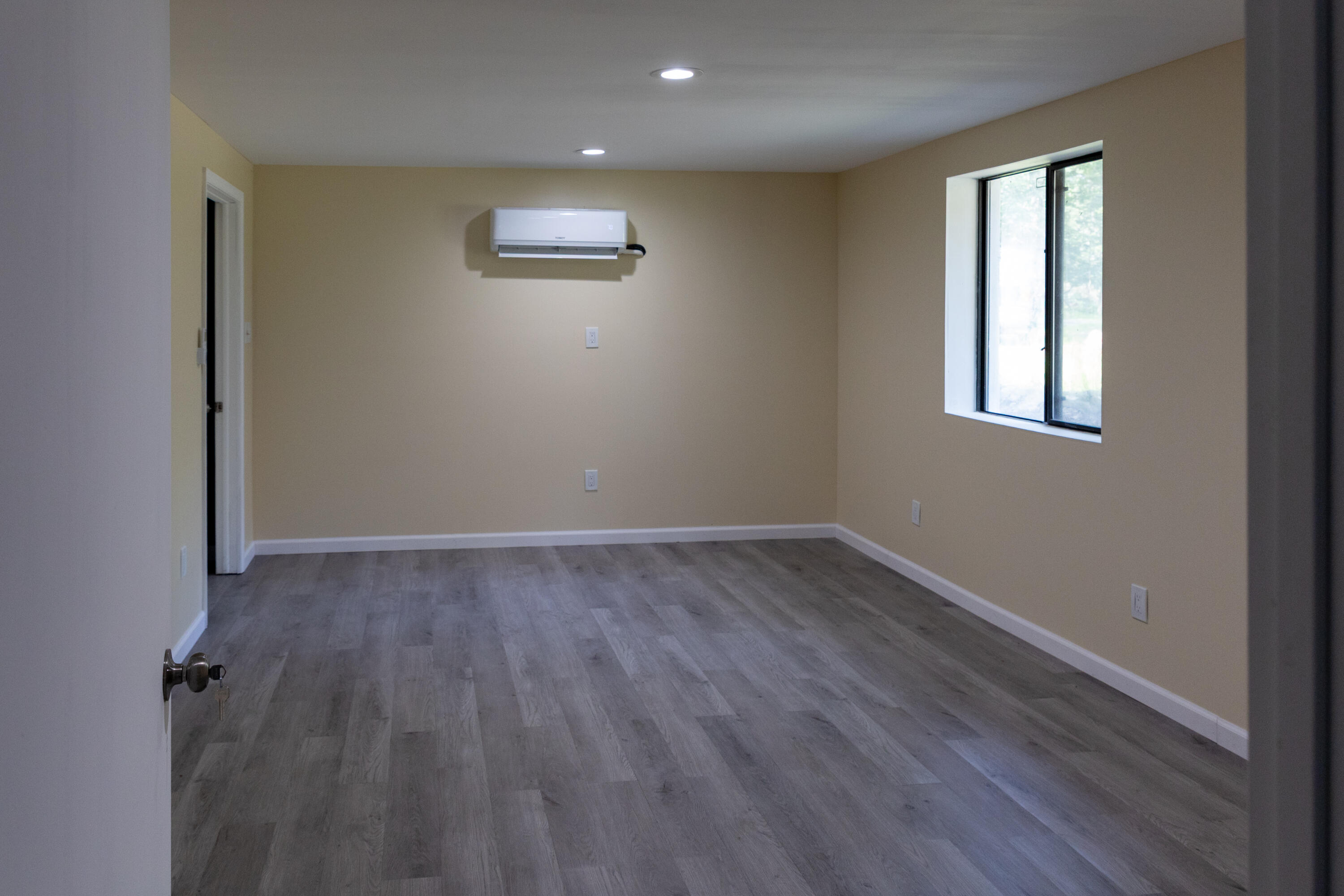 371 Ridge Circle Cresco, PA 18326 - Photo 31 of 40 an empty room with wooden floor and windows
