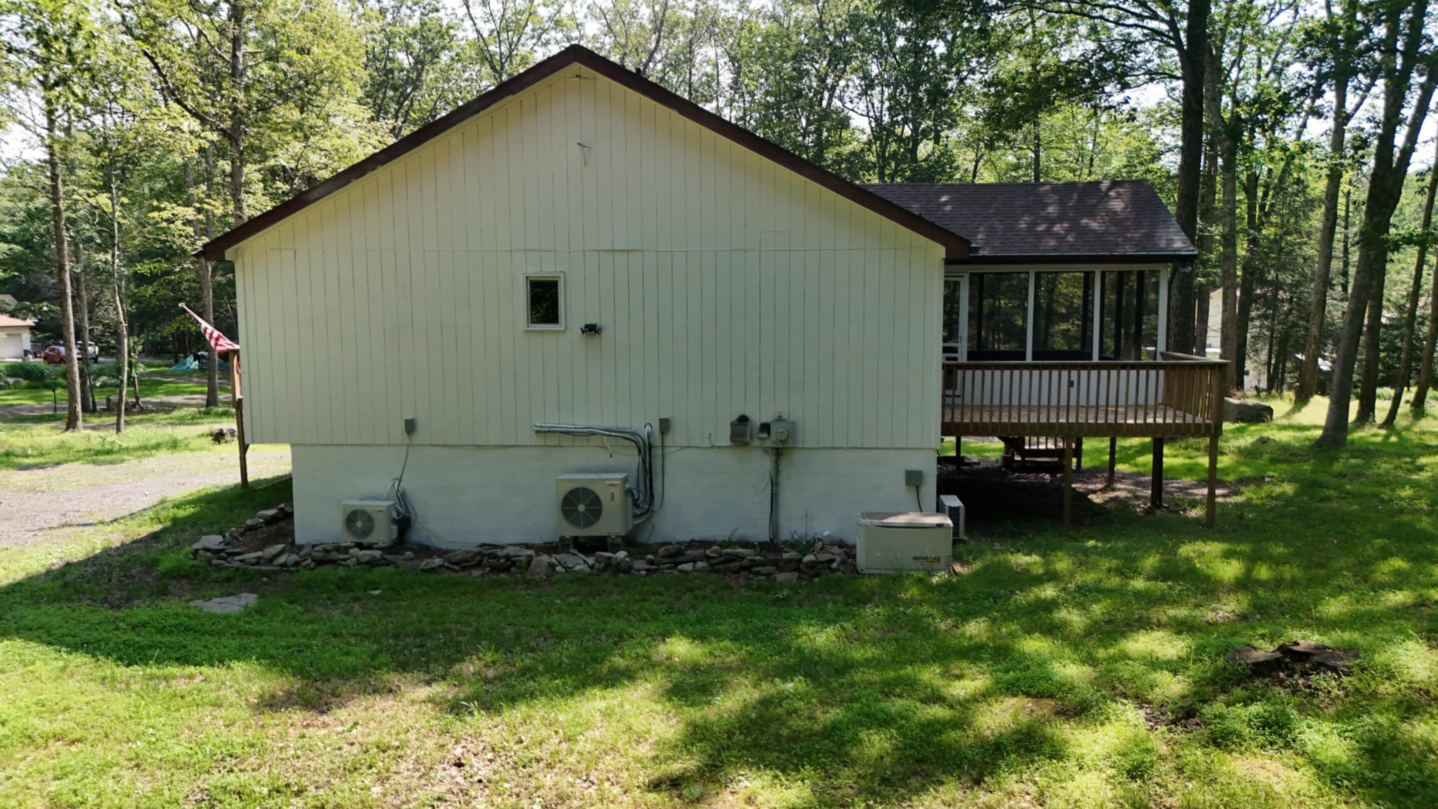 371 Ridge Circle Cresco, PA 18326 - Photo 36 of 40 a view of backyard with table and chairs and potted plants