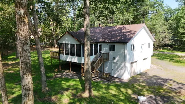 a house view with a garden space