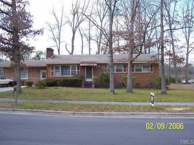 500 Cooper Road Raleigh, NC 27610 - Photo 1 of 1 a front view of a house with a garden