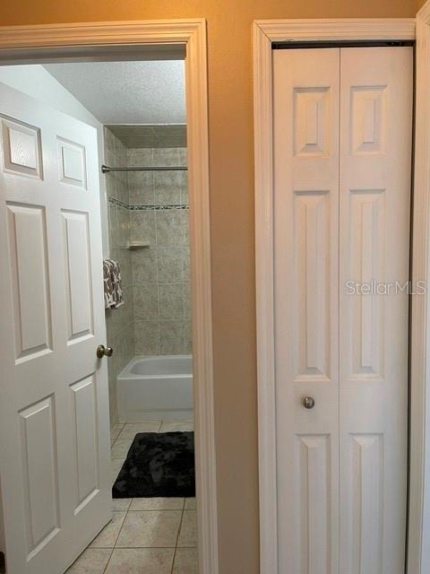 10985 Southwest 48th Terrace Ocala, FL 34476 - Photo 41 of 73 a bathroom with a bathtub and a shower