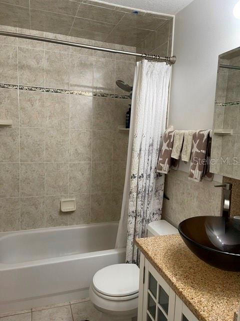 10985 Southwest 48th Terrace Ocala, FL 34476 - Photo 44 of 73 a bathroom with a granite countertop bathtub sink vanity mirror and toilet