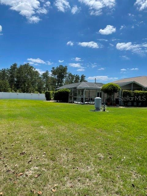 10985 Southwest 48th Terrace Ocala, FL 34476 - Photo 68 of 73 a view of a house with a big yard