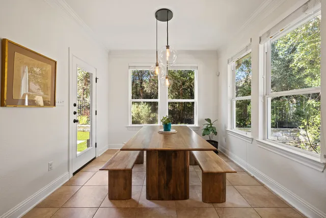 a bathroom with a granite countertop sink mirror and double