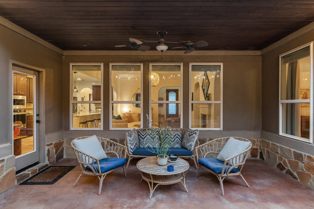 9116 Villa Norte Drive Austin, TX 78726 - Photo 24 of 40 a living room with furniture and a large window