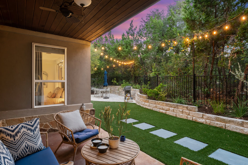 9116 Villa Norte Drive Austin, TX 78726 - Photo 25 of 40 a view of a chair and tables in the patio