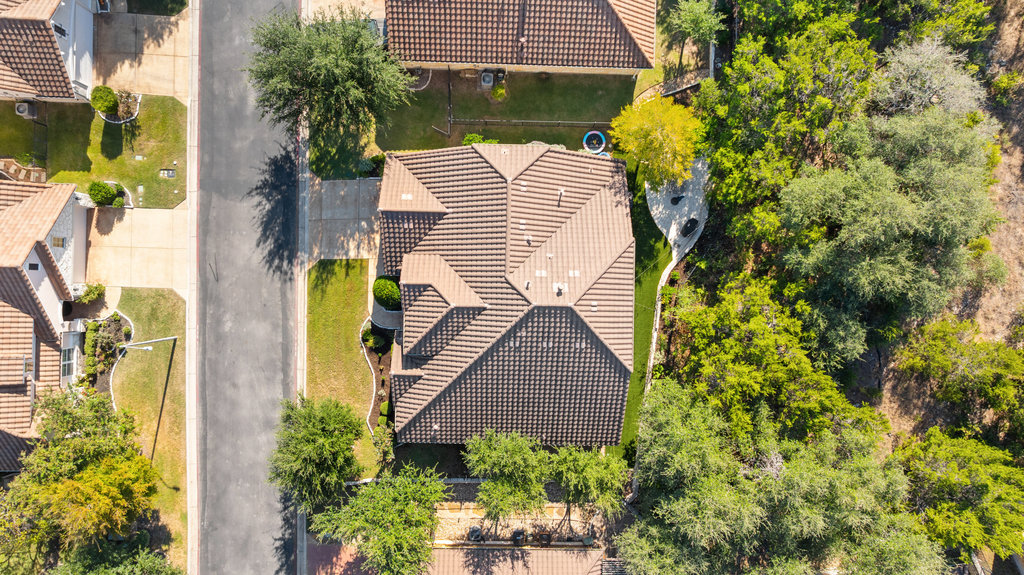 9116 Villa Norte Drive Austin, TX 78726 - Photo 27 of 40 a aerial view of a house with swimming pool and large trees