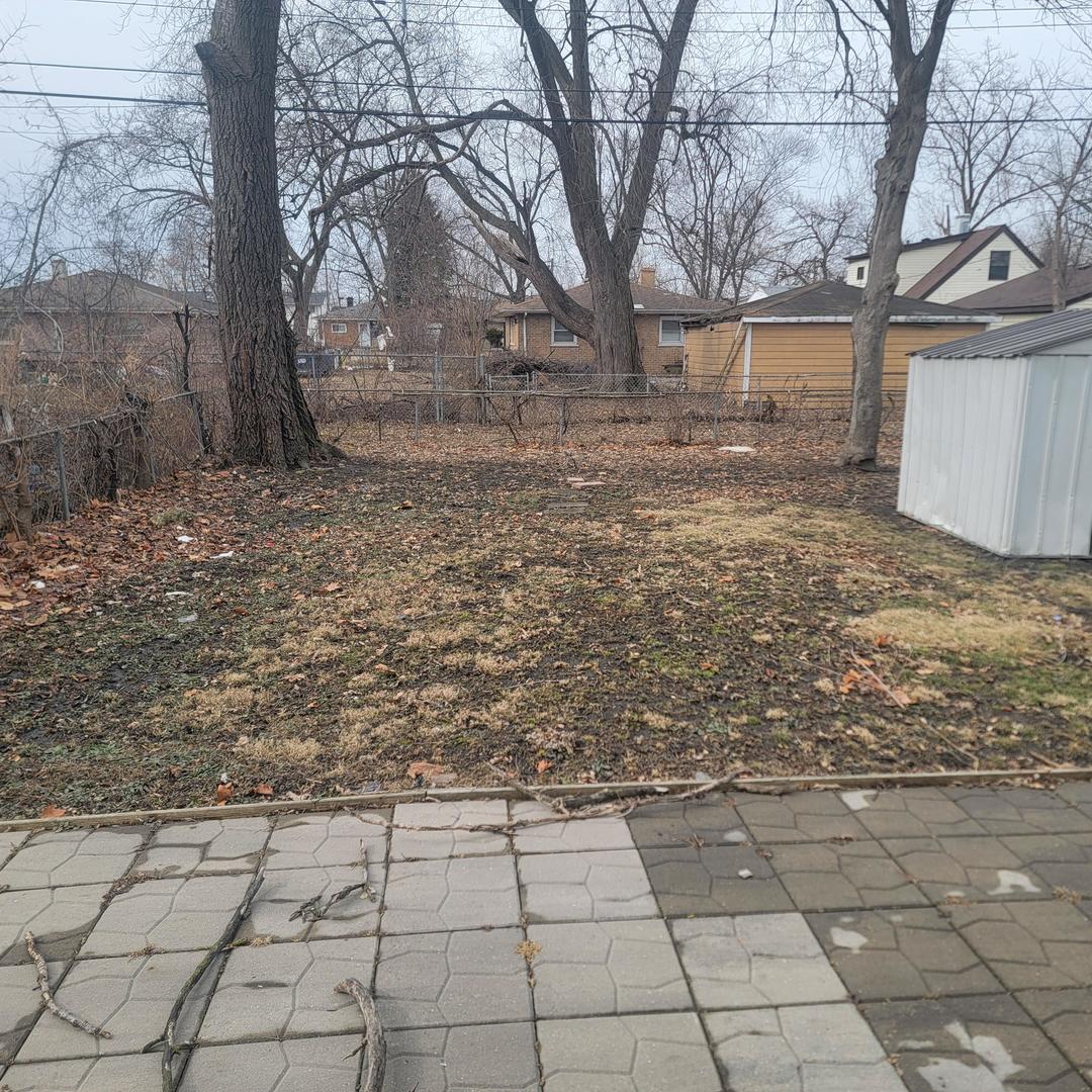16444 Wolcott Avenue Markham, IL 60428 - Photo 4 of 18 a view of yard with large trees
