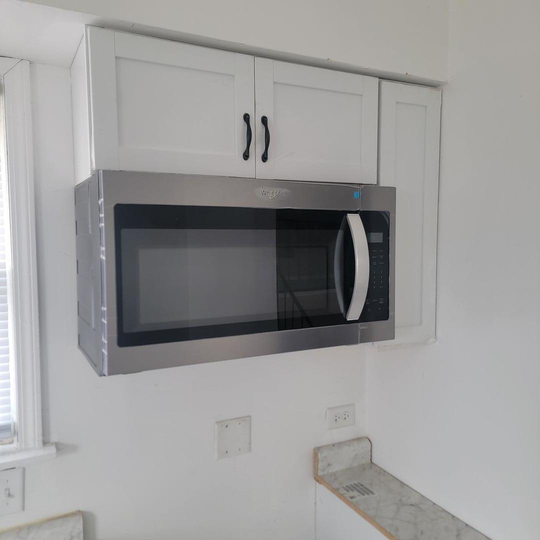 16444 Wolcott Avenue Markham, IL 60428 - Photo 6 of 18 a bathroom with a sink and a mirror