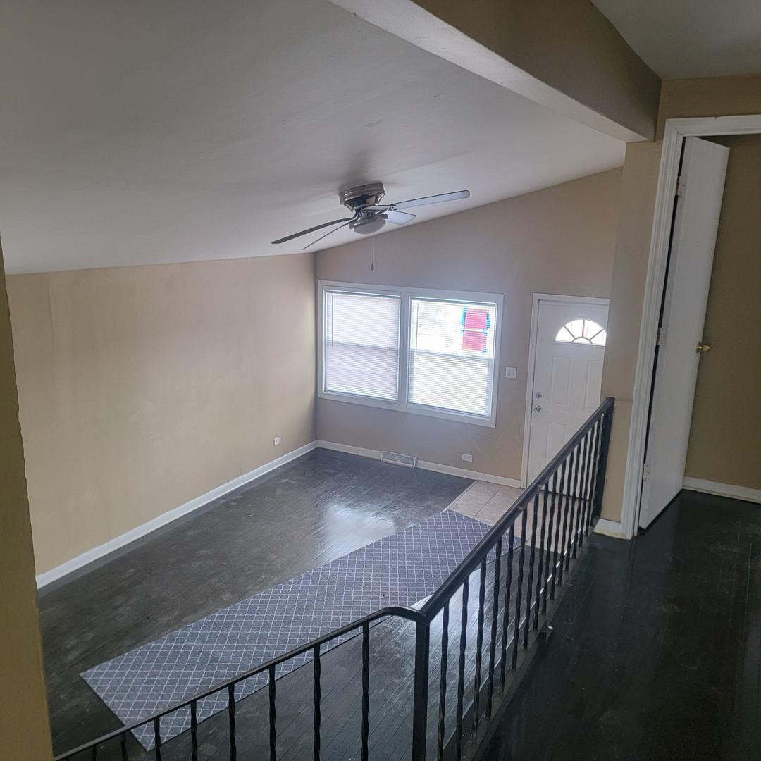 16444 Wolcott Avenue Markham, IL 60428 - Photo 8 of 18 a view of entryway with wooden floor
