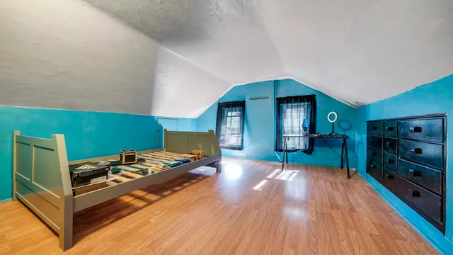 a room with furniture and a wooden floor