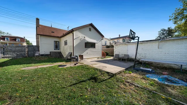 a house view with a backyard space