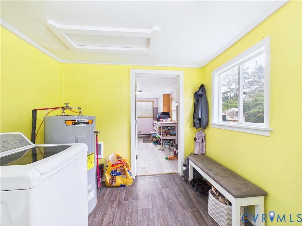 4868 Promise Land Road Appomattox, VA 24522 - Photo 16 of 43 Utility room featuring wood-finish flooring, a bri