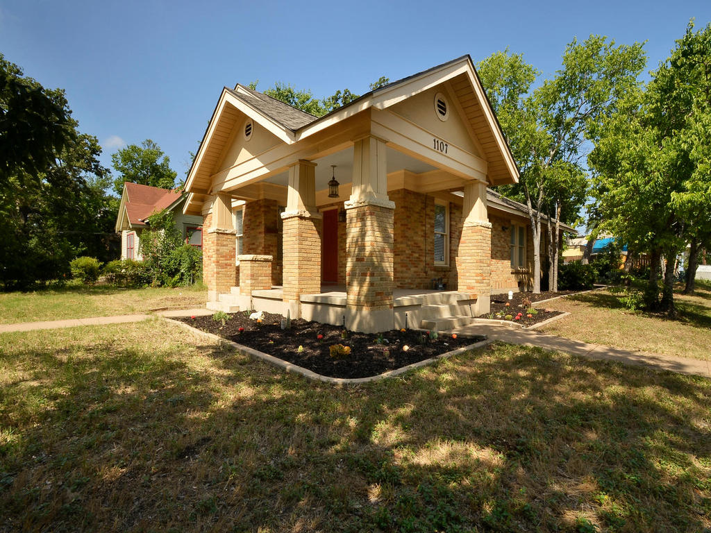 a front view of house with yard