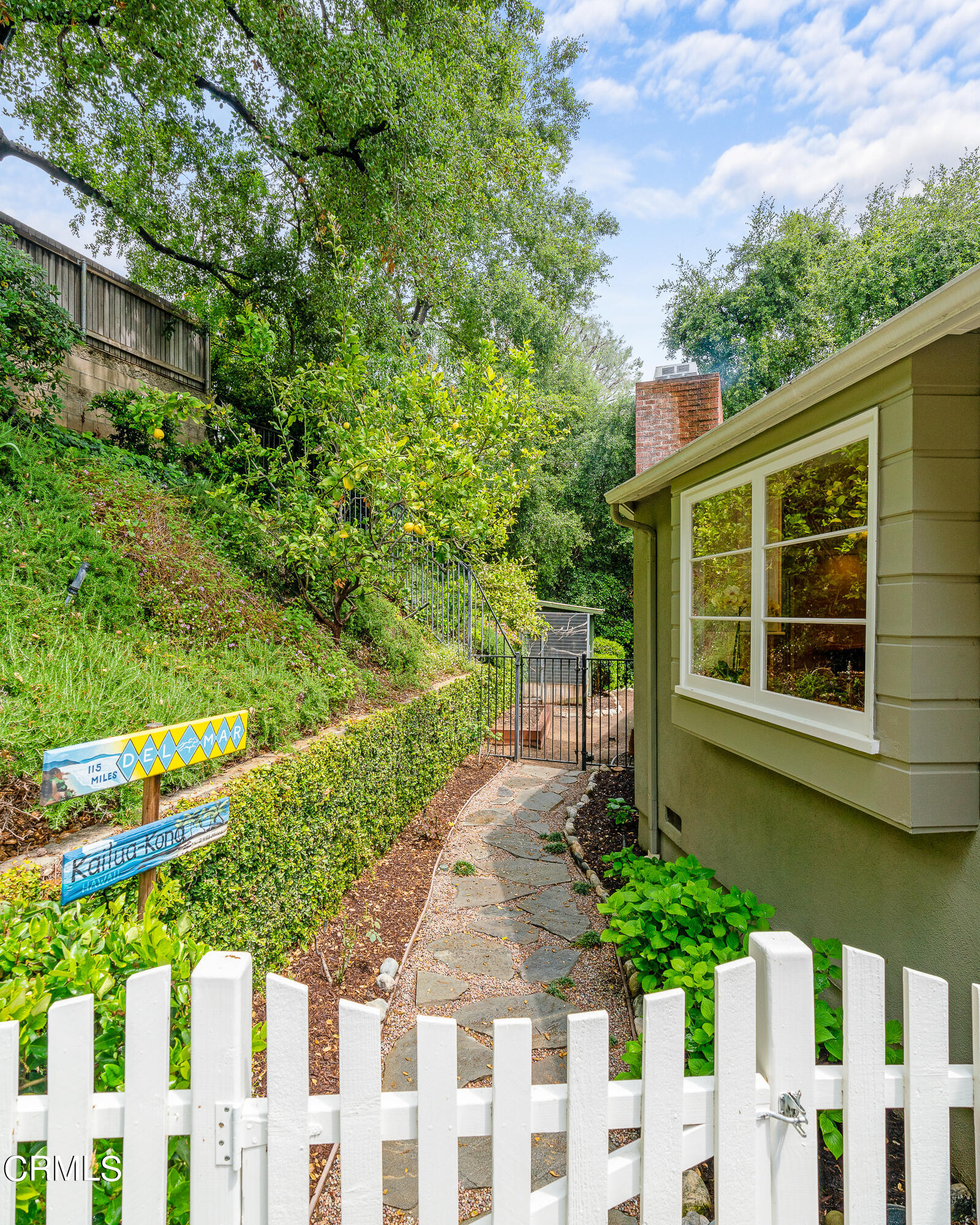 1265 Inverness Drive Pasadena, CA 91103 - Photo 39 of 44 a front view of a house with a yard