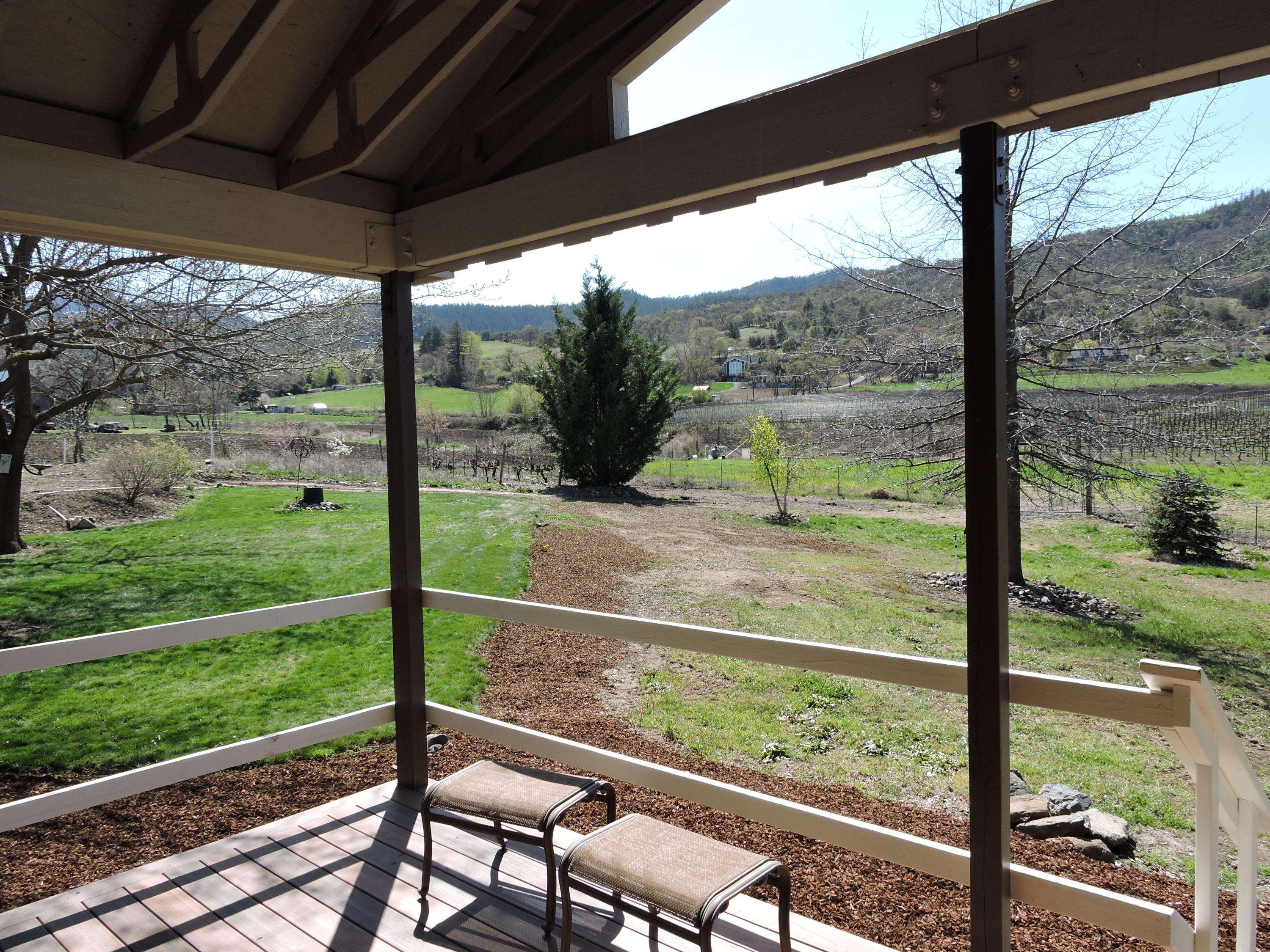 1381 Foss Road Talent, OR 97540 - Photo 28 of 41 Inviting covered back deck with expansive mountain views