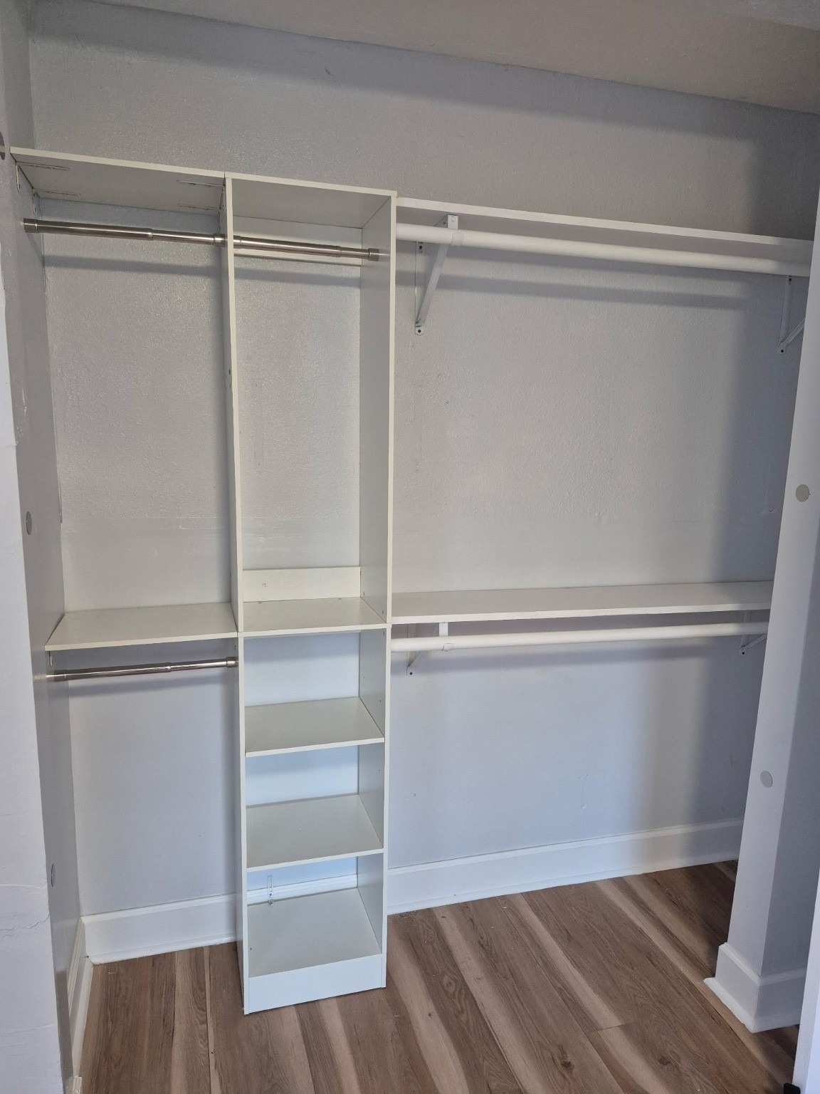 4123 Littlecrest Road Houston, TX 77093 - Photo 14 of 16 a view of an empty walk in closet