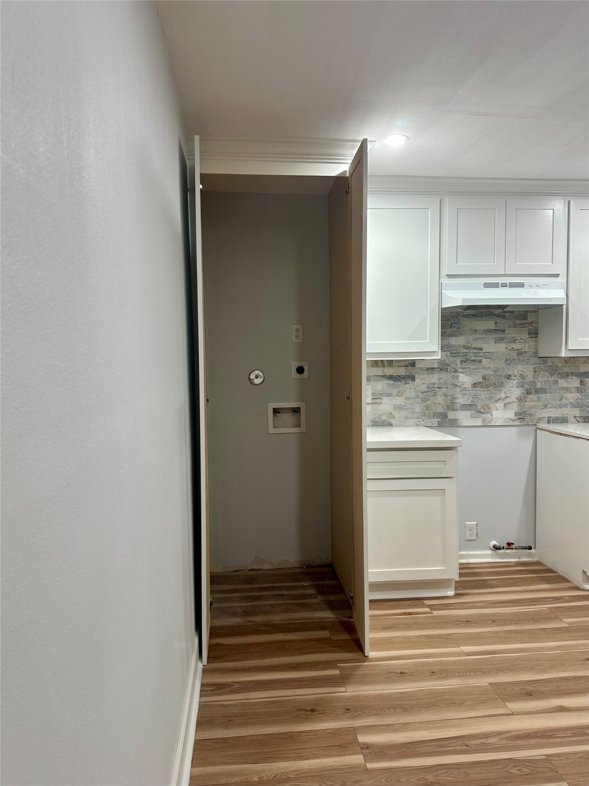 4123 Littlecrest Road Houston, TX 77093 - Photo 5 of 16 a view of a kitchen from the hallway