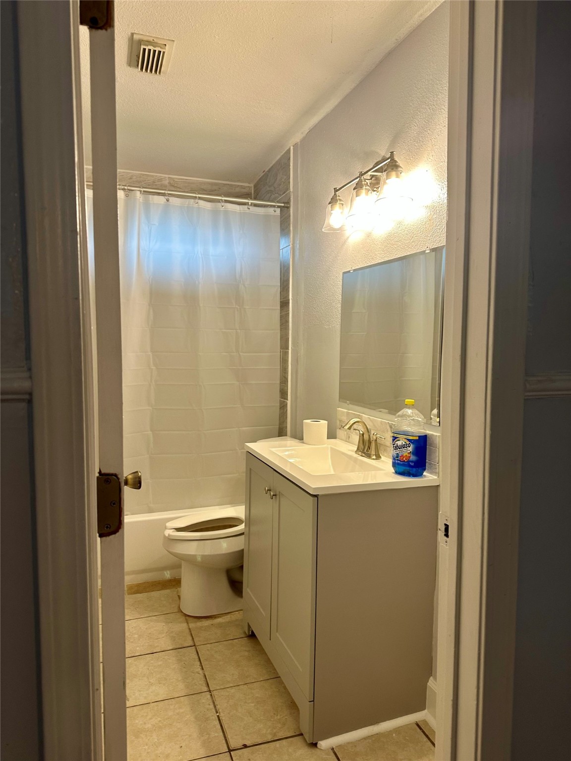 4123 Littlecrest Road Houston, TX 77093 - Photo 8 of 16 a bathroom with a sink a toilet and shower