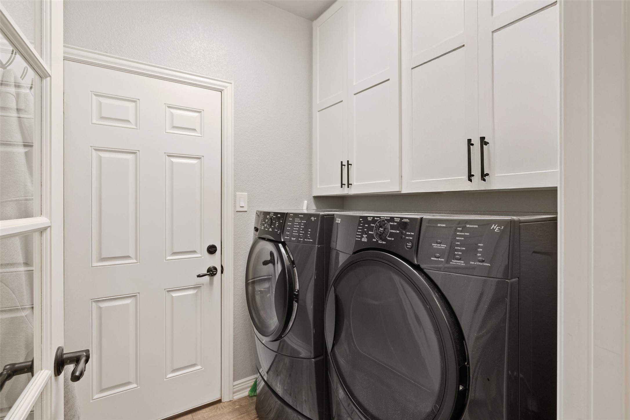 134 Prairie Springs Cove Georgetown, TX 78626 - Photo 14 of 34 a view of a storage & utility room with washer and dryer