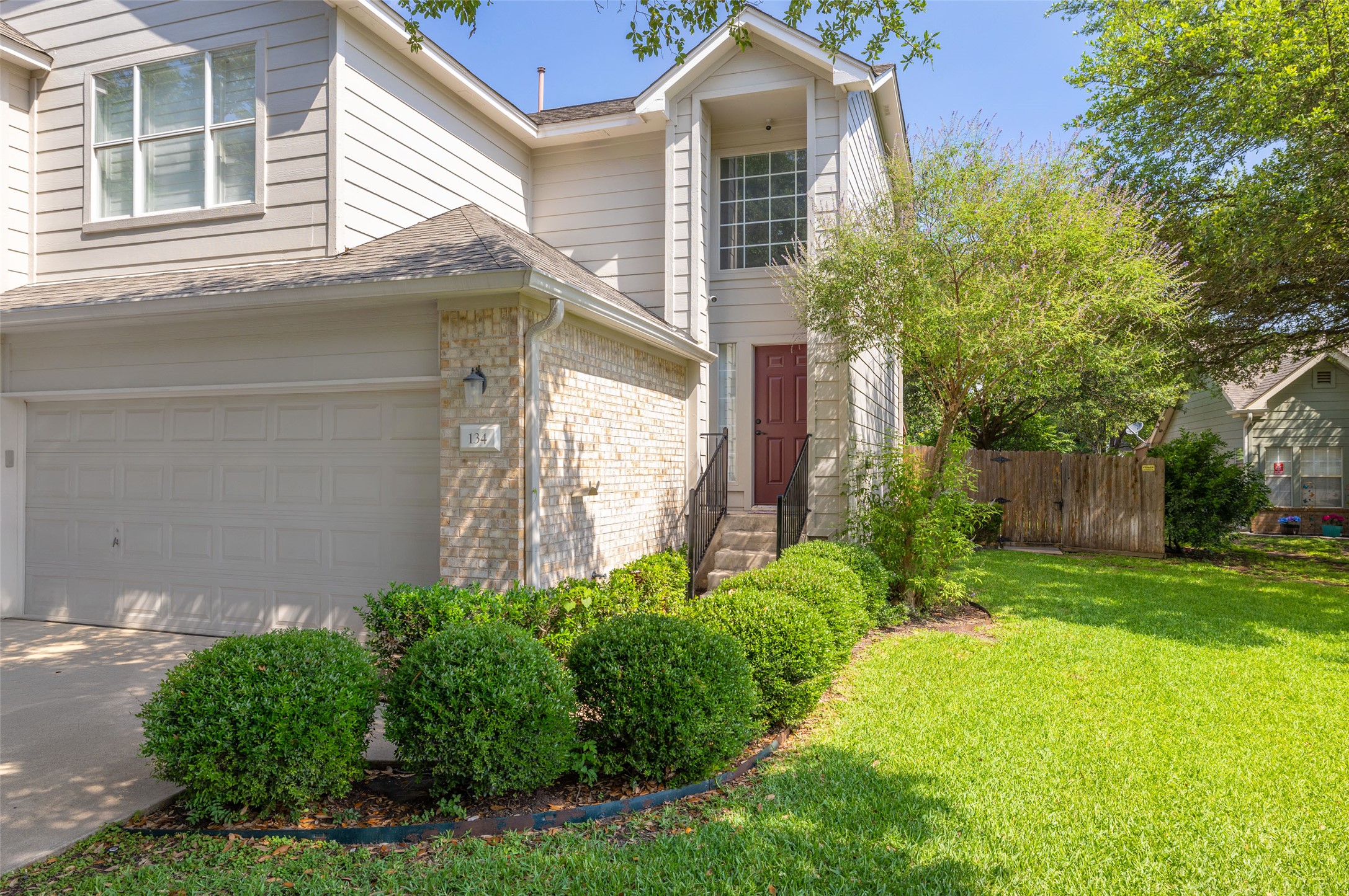134 Prairie Springs Cove Georgetown, TX 78626 - Photo 2 of 34 a front view of a house with garden