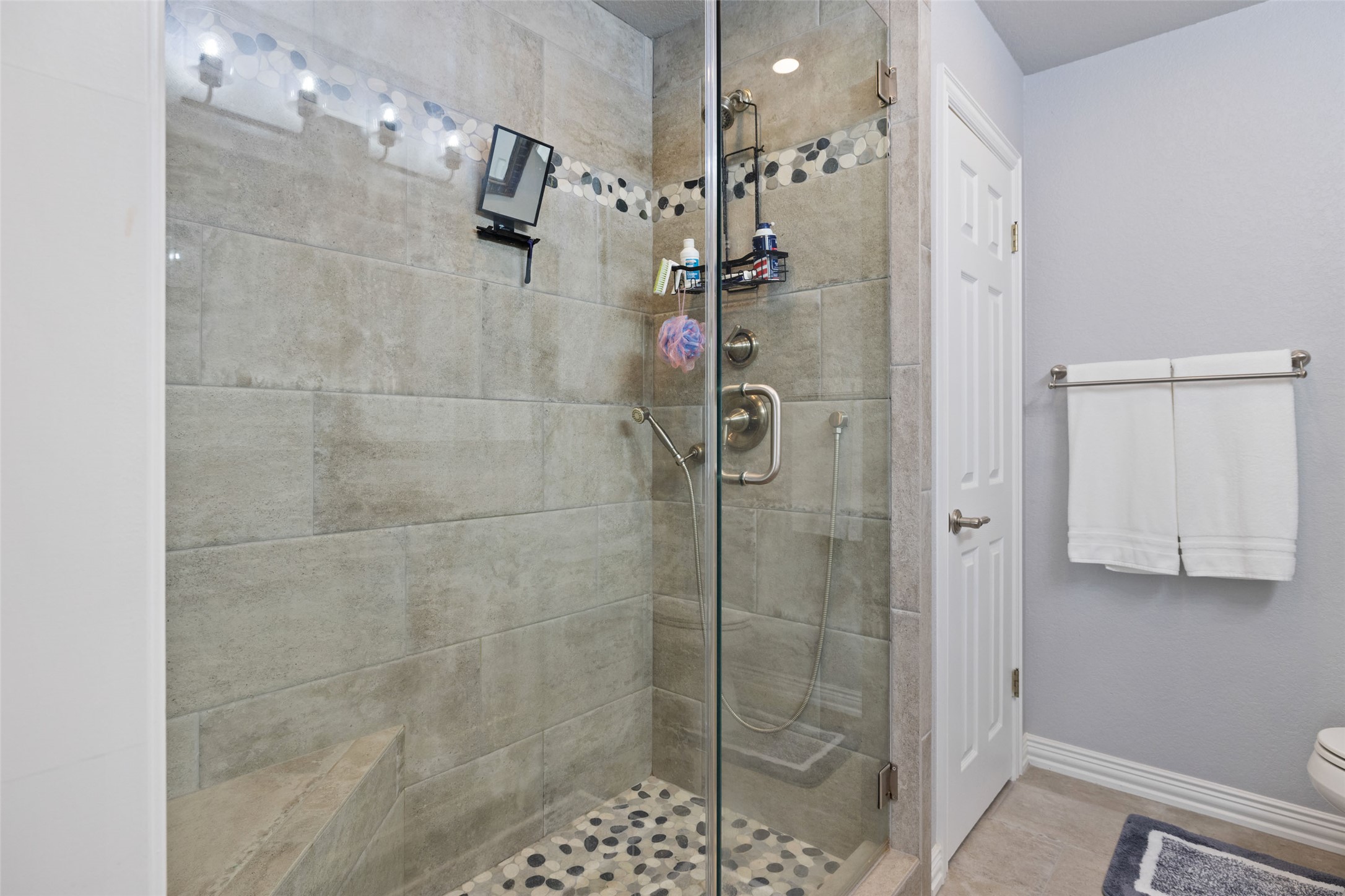 134 Prairie Springs Cove Georgetown, TX 78626 - Photo 22 of 34 a bathroom with a shower