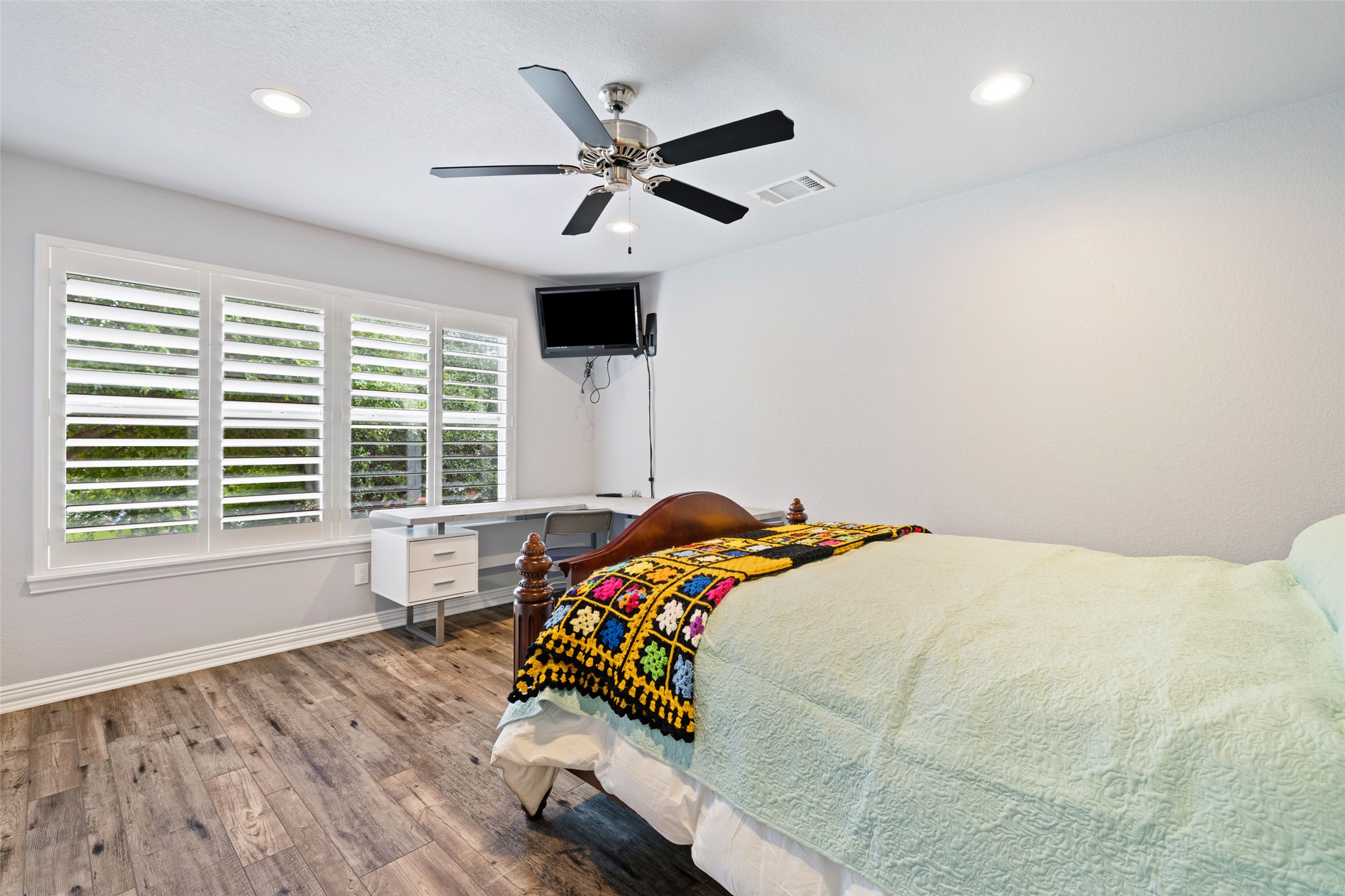 134 Prairie Springs Cove Georgetown, TX 78626 - Photo 26 of 34 a bedroom with a bed and a large window