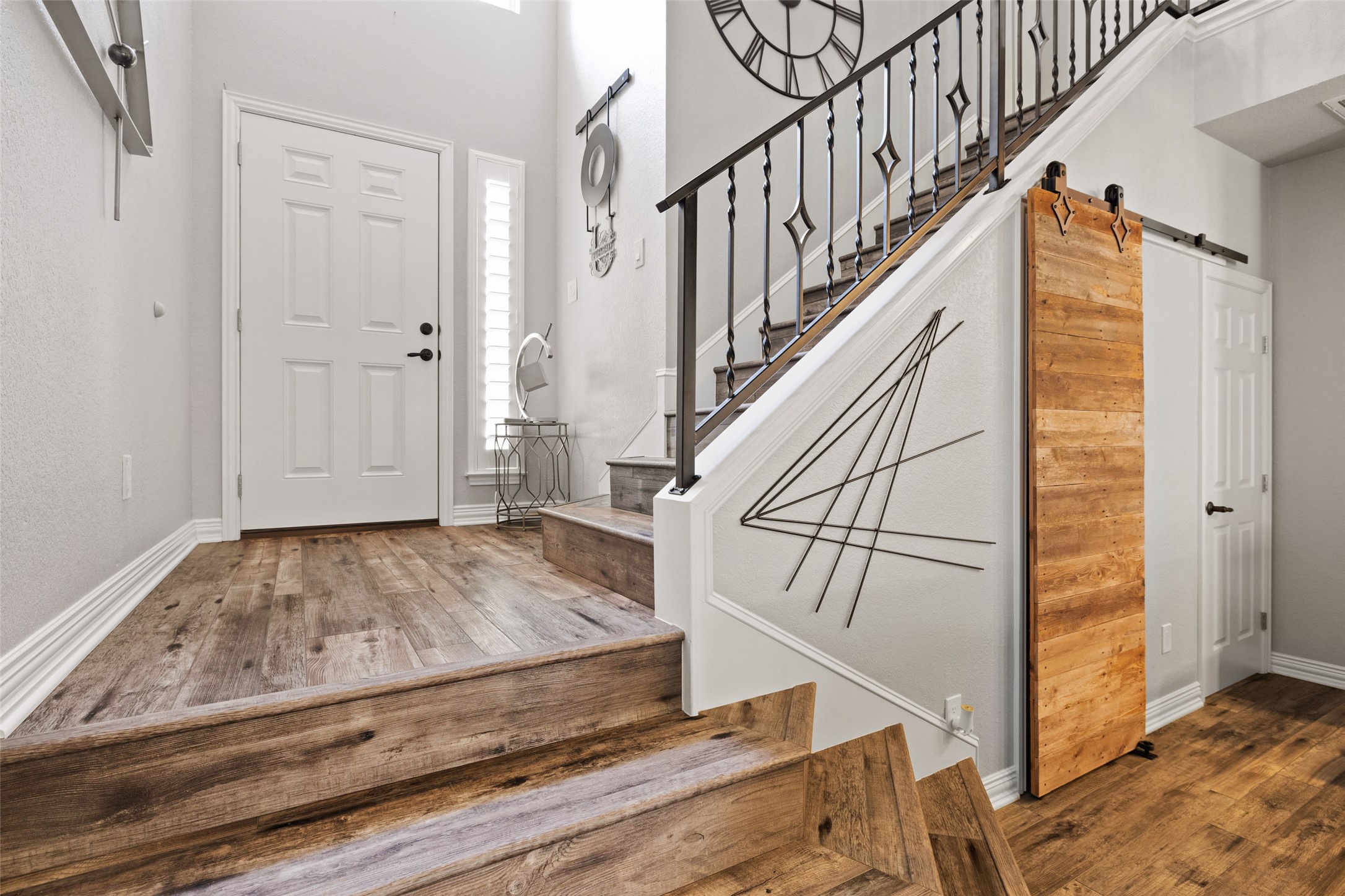134 Prairie Springs Cove Georgetown, TX 78626 - Photo 3 of 34 a view of entryway and hall with wooden floor
