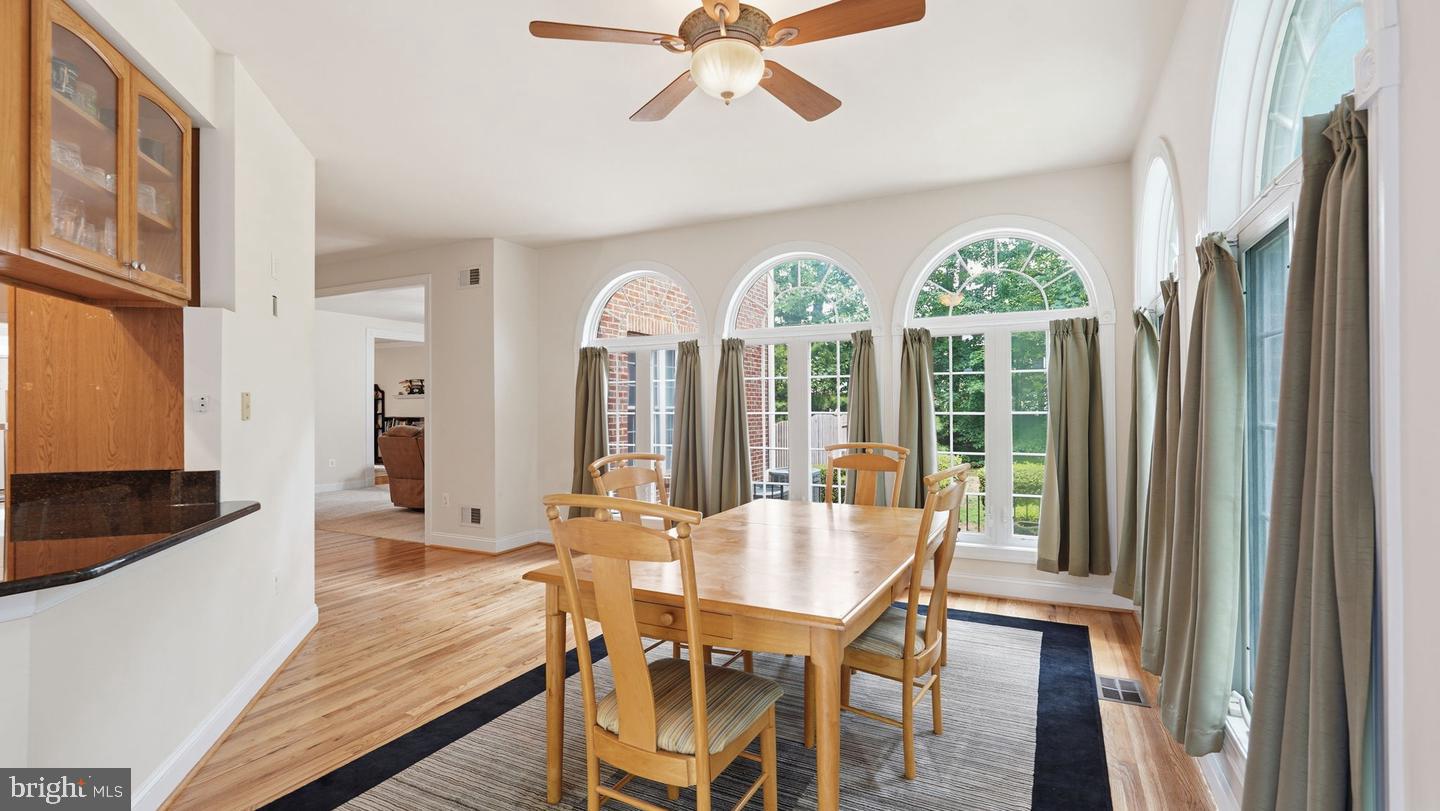 13301 Dumfries Road Manassas, VA 20112 - Photo 16 of 49 Bright dining space with elegant arches.