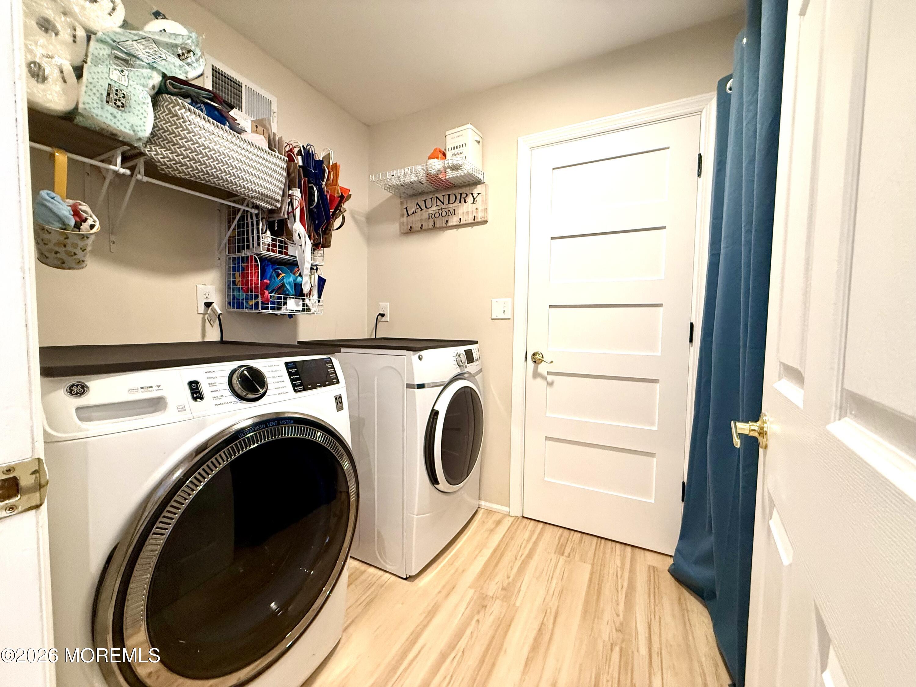 20 Long Road Freehold, NJ 07728 - Photo 15 of 20 a utility room with dryer and washer